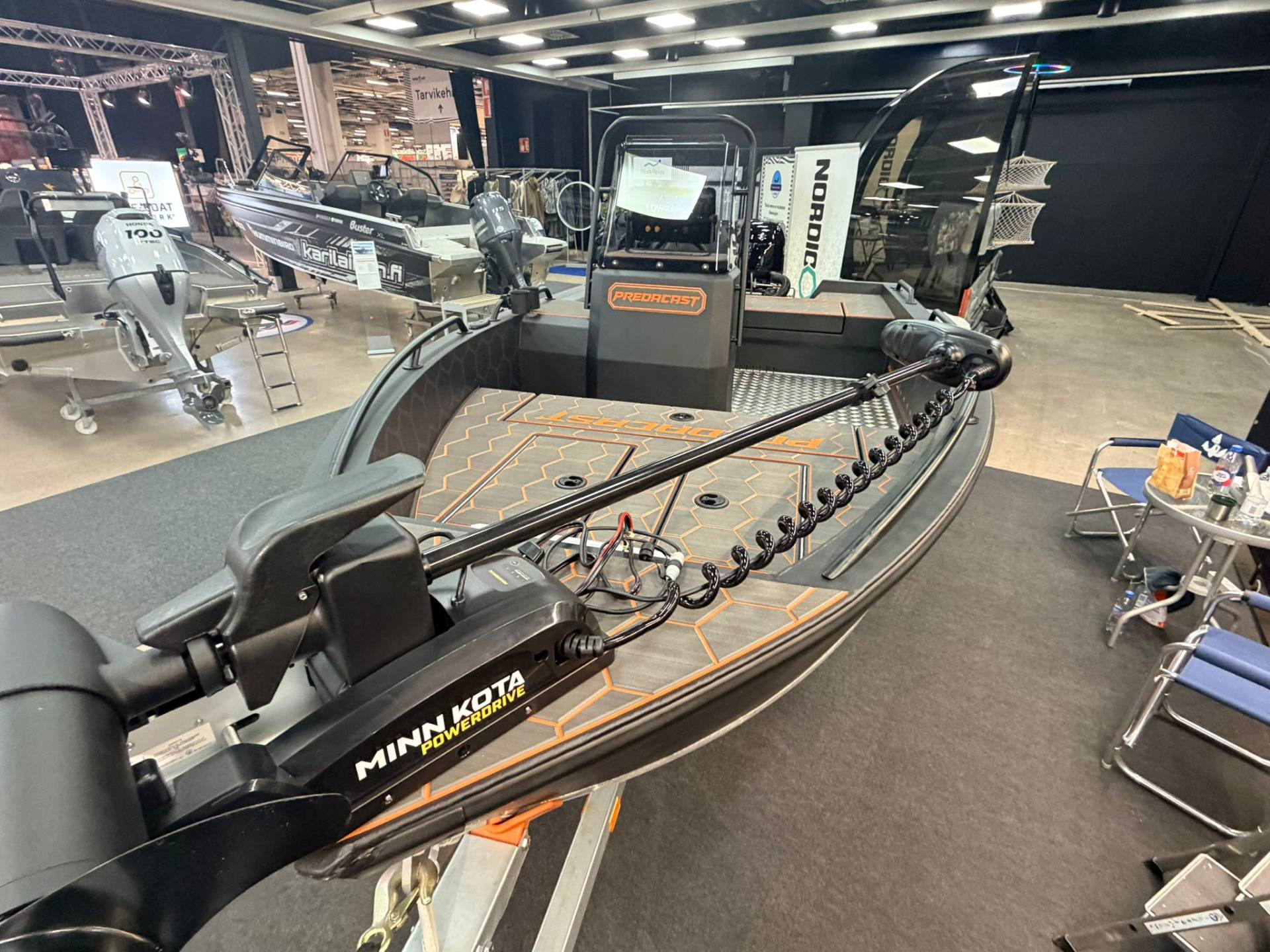 Predacast fishing boat featuring a Minn Kota bow-mount trolling motor.